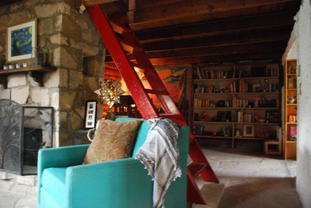 View of living area and stairs up to 2 bedrooms